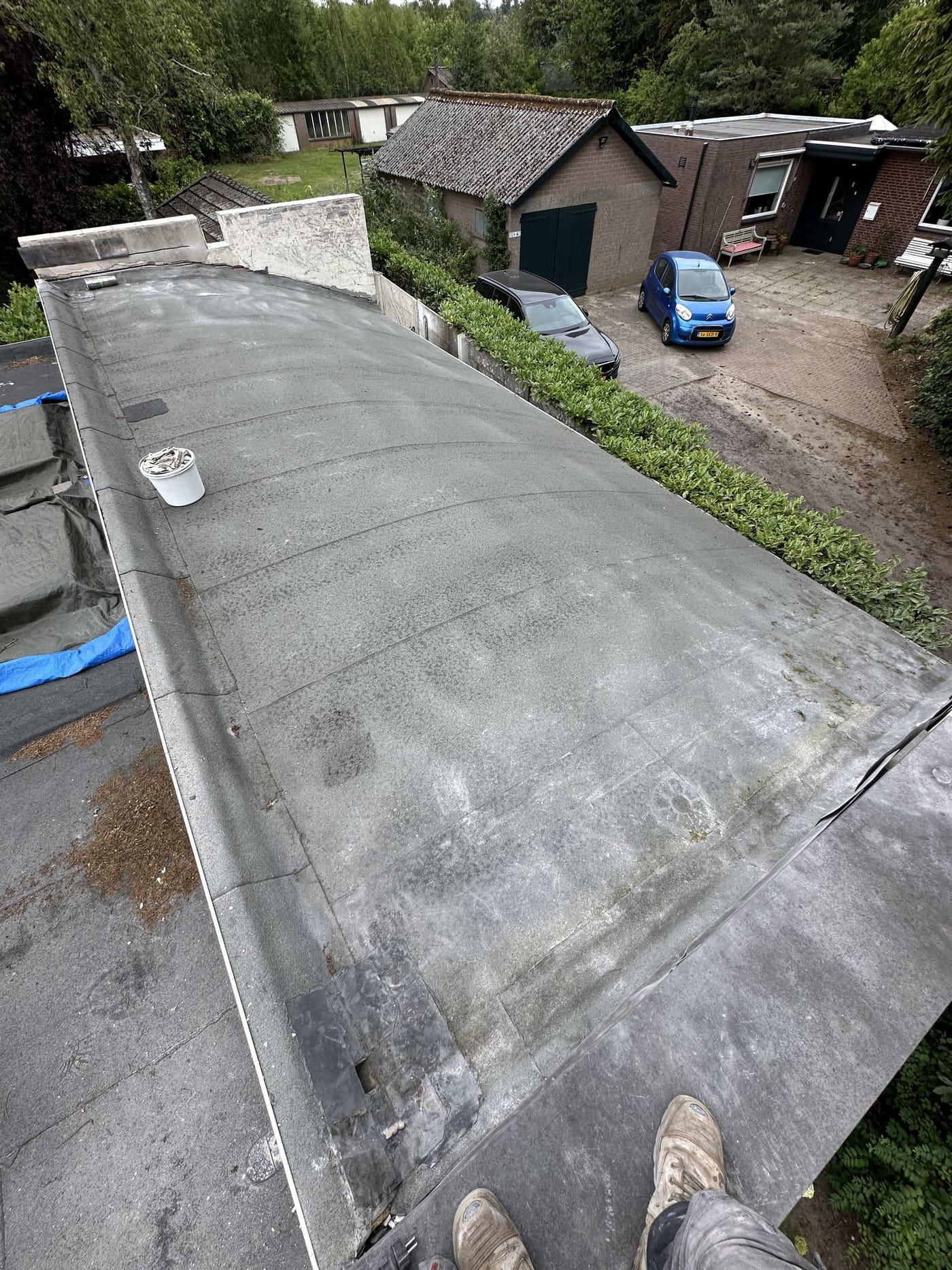 Platte Dakrenovatie